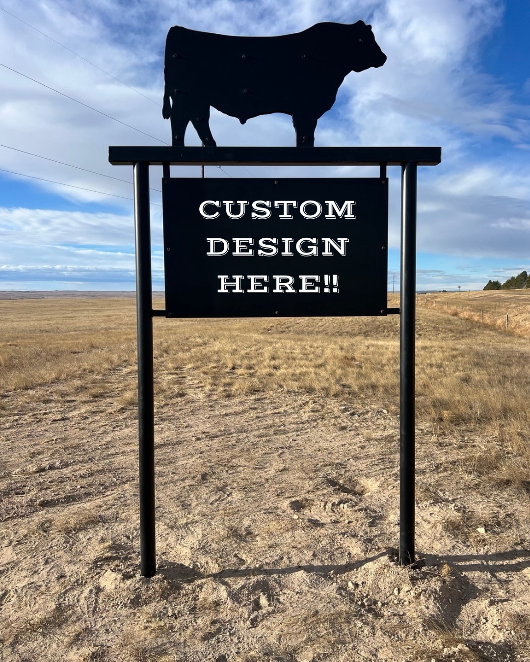 Custom steel ranch sign with a bull silhouette on top, on two steel posts